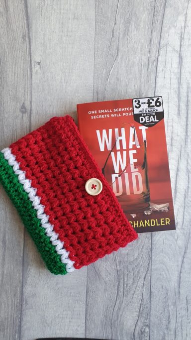 A book sleeve with a green and white stripe and the rest is red, to look like a watermelon