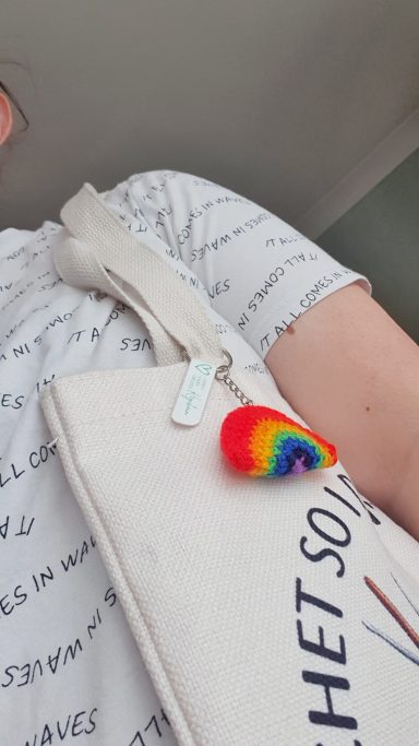 a keyring made to look like a rainbow
